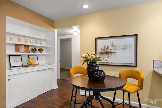 222 Dawn St, Eagle, ID 83616 - dining area featuring dark wood-type flooring and baseboards