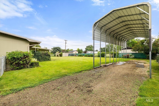 222 Dawn St, Eagle, ID 83616 - view of yard featuring a detached carport and driveway