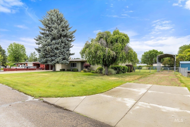 222 Dawn St, Eagle, ID 83616 - view of front of house featuring a carport and stucco siding