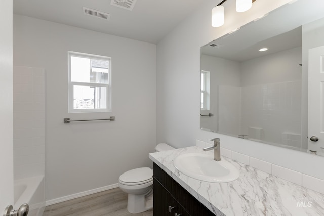 3937 W Tribute St, Meridian, ID 83642 - full bathroom with toilet, a healthy amount of sunlight, and visible vents