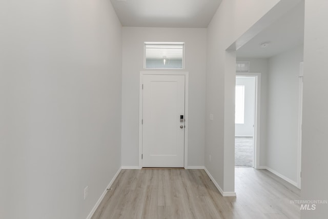 3937 W Tribute St, Meridian, ID 83642 - foyer featuring light wood-style flooring and baseboards
