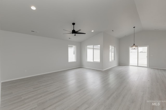 3937 W Tribute St, Meridian, ID 83642 - interior space featuring lofted ceiling, ceiling fan with notable chandelier, visible vents, baseboards, and light wood-style floors