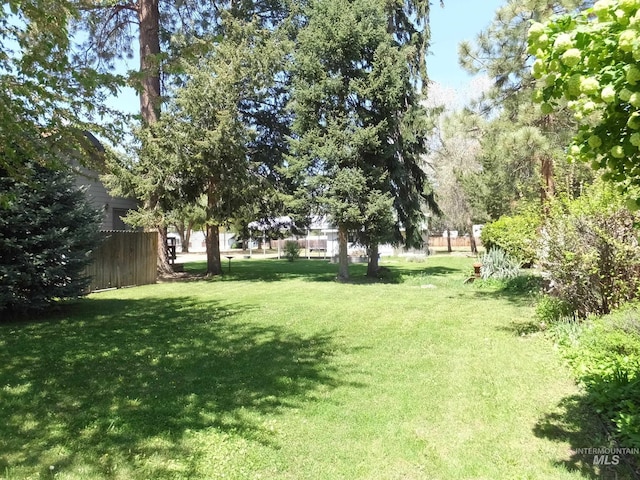 view of yard featuring fence