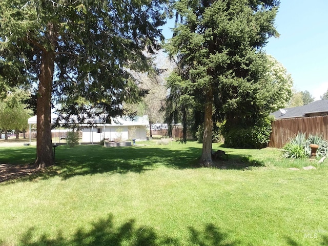 view of yard featuring fence