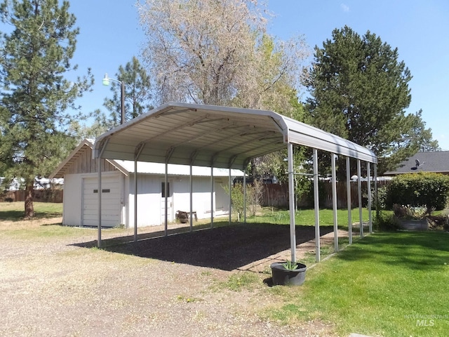 view of vehicle parking with a detached carport