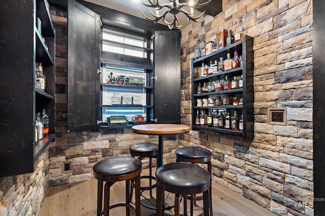 1358 N Morehouse Ave, Eagle, ID 83616 - indoor wet bar featuring hardwood / wood-style flooring and a chandelier