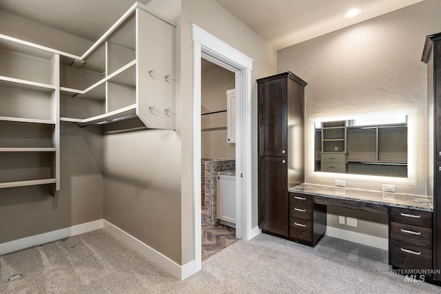 1358 N Morehouse Ave, Eagle, ID 83616 - walk in closet with carpet flooring and built in desk