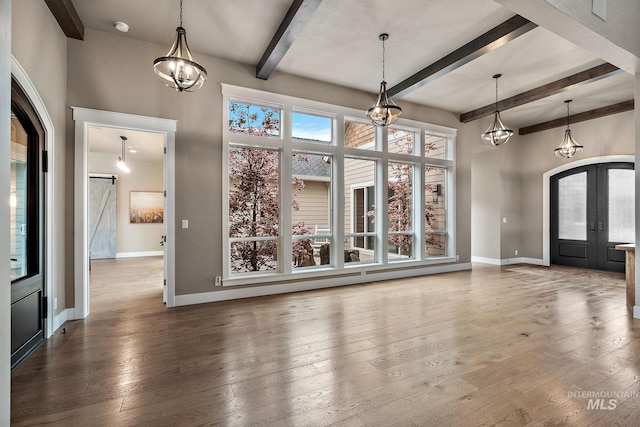 1358 N Morehouse Ave, Eagle, ID 83616 - entryway featuring beamed ceiling, baseboards, french doors, hardwood / wood-style flooring, and healthy amount of natural light