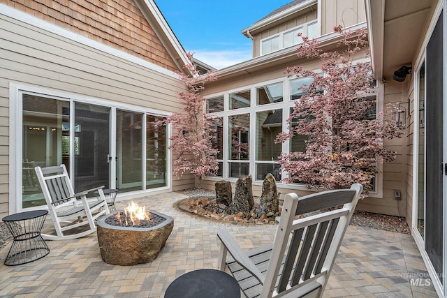 1358 N Morehouse Ave, Eagle, ID 83616 - view of patio featuring a fire pit