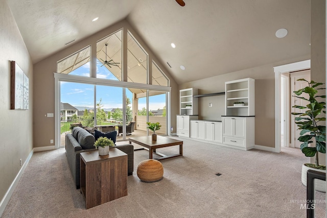1358 N Morehouse Ave, Eagle, ID 83616 - living room with carpet flooring, high vaulted ceiling, ceiling fan, baseboards, and recessed lighting