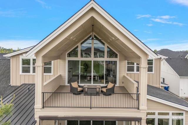 1358 N Morehouse Ave, Eagle, ID 83616 - rear view of house with board and batten siding and outdoor lounge area
