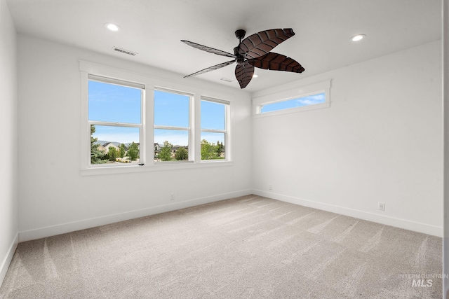 1358 N Morehouse Ave, Eagle, ID 83616 - empty room featuring a ceiling fan, baseboards, light carpet, and recessed lighting