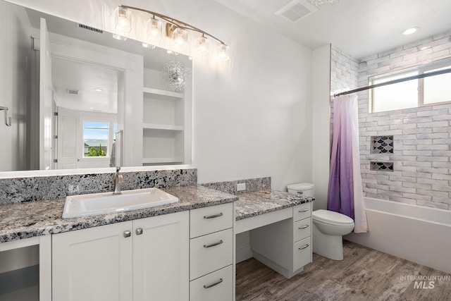 1358 N Morehouse Ave, Eagle, ID 83616 - full bathroom featuring plenty of natural light, wood finished floors, toilet, and vanity