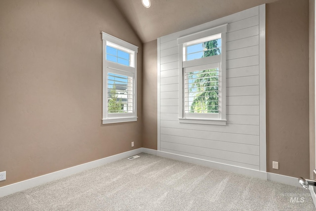 1358 N Morehouse Ave, Eagle, ID 83616 - empty room with healthy amount of natural light, carpet flooring, lofted ceiling, and baseboards