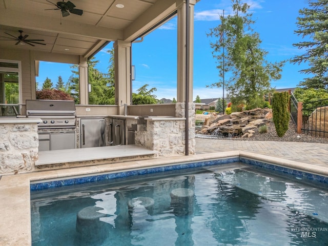 1358 N Morehouse Ave, Eagle, ID 83616 - swimming pool with area for grilling, a ceiling fan, and a sink