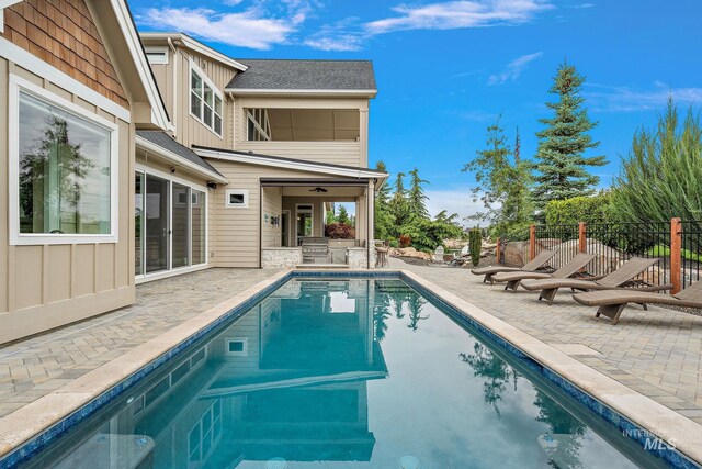 1358 N Morehouse Ave, Eagle, ID 83616 - view of swimming pool featuring a patio area, exterior kitchen, and fence