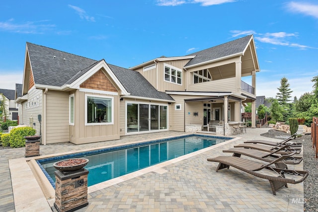 1358 N Morehouse Ave, Eagle, ID 83616 - outdoor pool with a patio and a ceiling fan