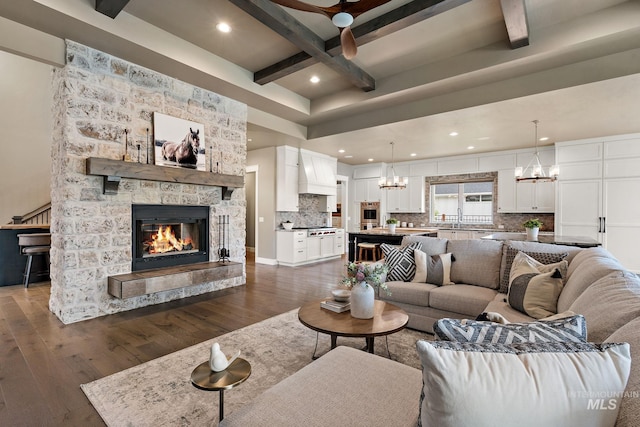 1358 N Morehouse Ave, Eagle, ID 83616 - living area featuring a chandelier, beam ceiling, a fireplace, dark wood finished floors, and recessed lighting