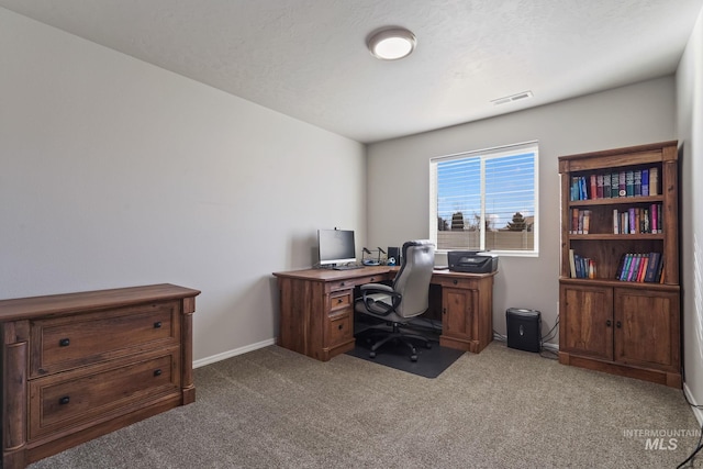 home office featuring light colored carpet