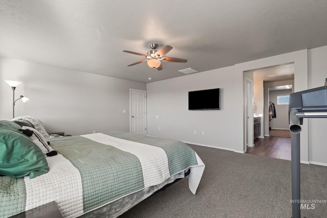 bedroom featuring dark colored carpet and ceiling fan