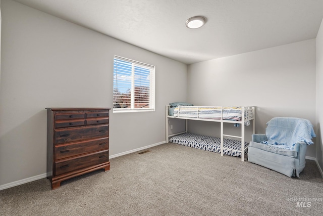 bedroom featuring carpet