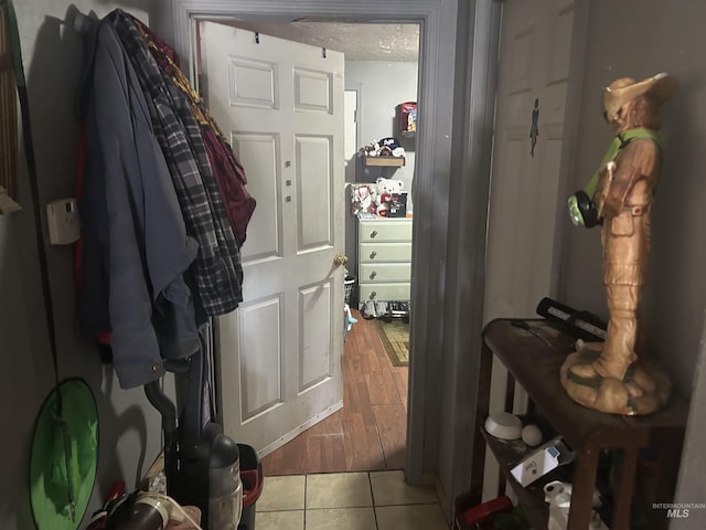 walk in closet featuring light tile patterned floors