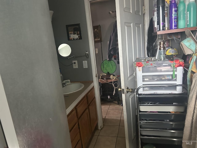 bathroom featuring tile patterned floors and vanity