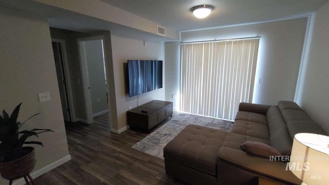 living room with hardwood / wood-style flooring