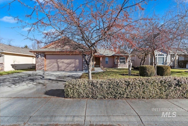 ranch-style home with a garage