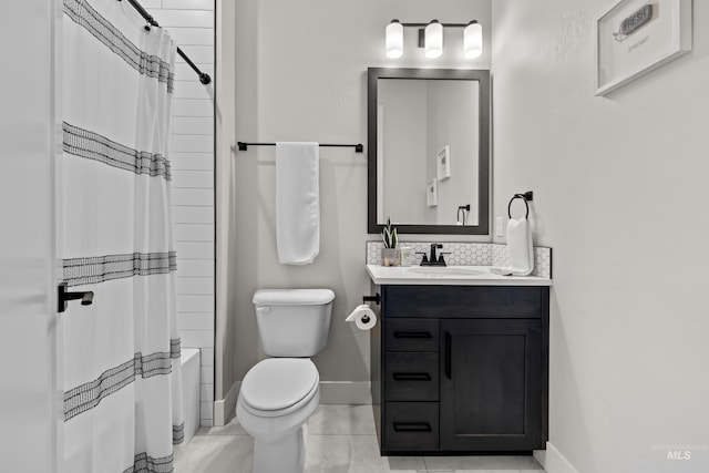 full bathroom featuring tile patterned flooring, vanity, tasteful backsplash, shower / bath combination with curtain, and toilet