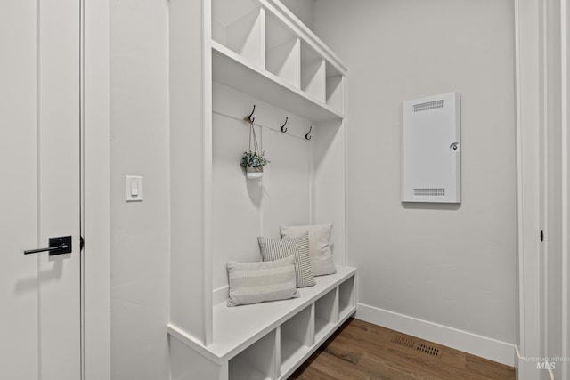 mudroom with dark hardwood / wood-style floors