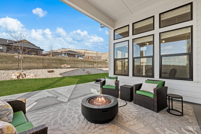 view of patio featuring a fire pit