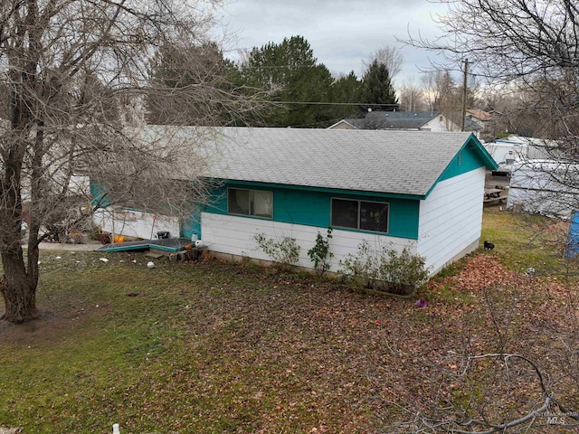 exterior space featuring a front lawn