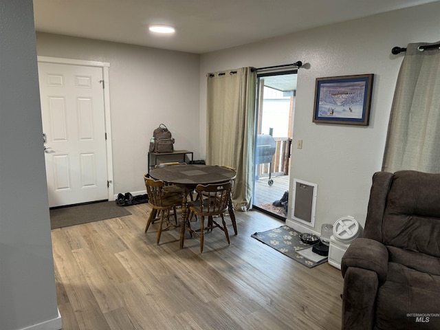 dining area featuring wood finished floors