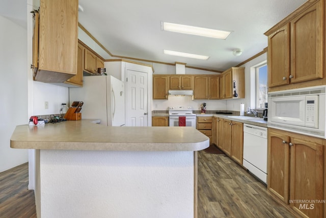 kitchen featuring sink, white appliances, crown molding, dark hardwood / wood-style flooring, and vaulted ceiling