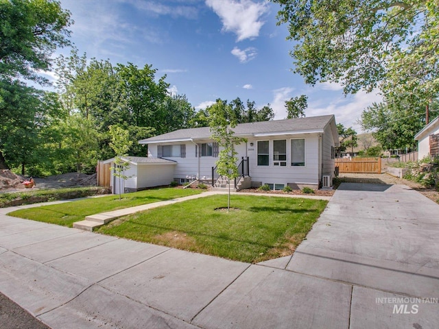 3004/3006 W Gerrard St, Boise, ID 83703 - view of front of home featuring concrete driveway and an outdoor structure