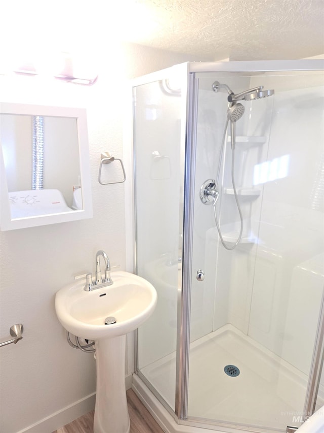 3004/3006 W Gerrard St, Boise, ID 83703 - bathroom with a shower stall and wood finished floors