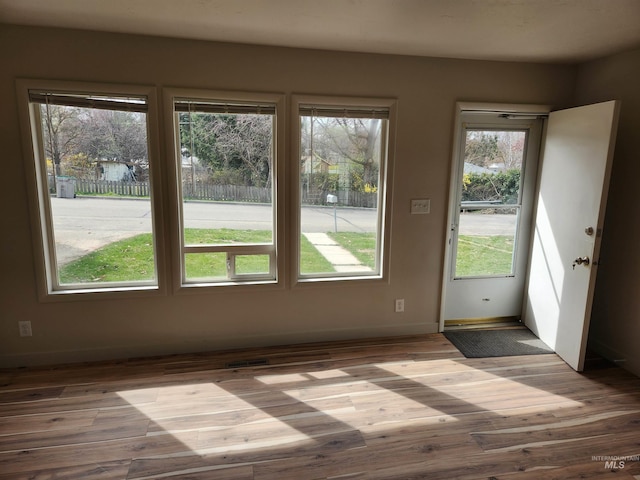 3004/3006 W Gerrard St, Boise, ID 83703 - doorway with healthy amount of natural light and wood finished floors