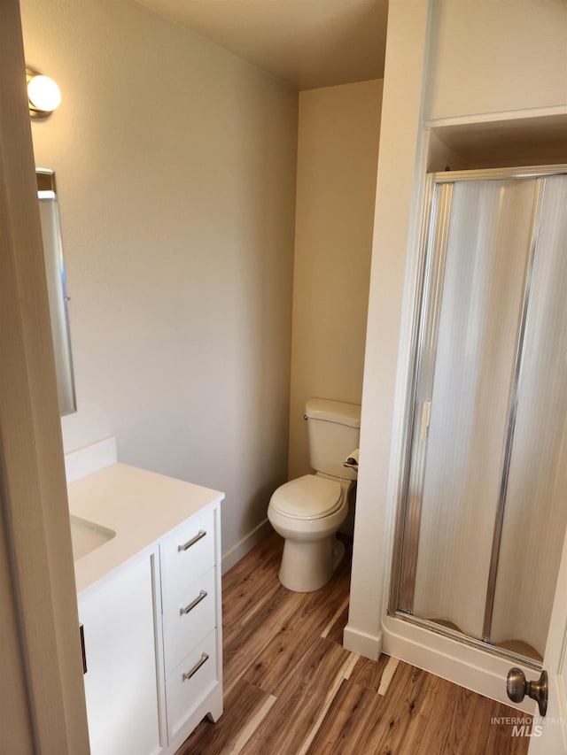 3004/3006 W Gerrard St, Boise, ID 83703 - full bath featuring vanity, a shower stall, and wood finished floors