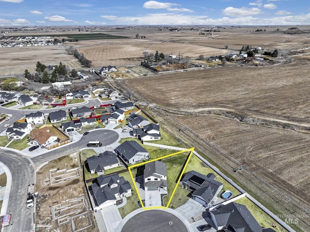 aerial view with a residential view and a rural view