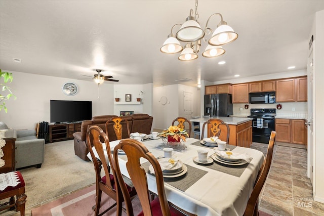 4590 E Stone Falls Dr, Nampa, ID 83686 - dining area featuring a chandelier, ceiling fan, and recessed lighting