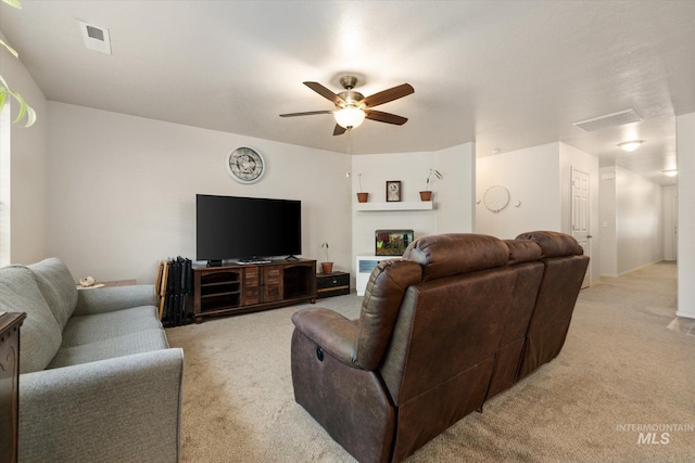 4590 E Stone Falls Dr, Nampa, ID 83686 - living room featuring light colored carpet and a ceiling fan