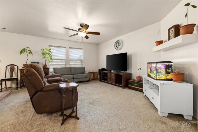 4590 E Stone Falls Dr, Nampa, ID 83686 - living area with light colored carpet and a ceiling fan