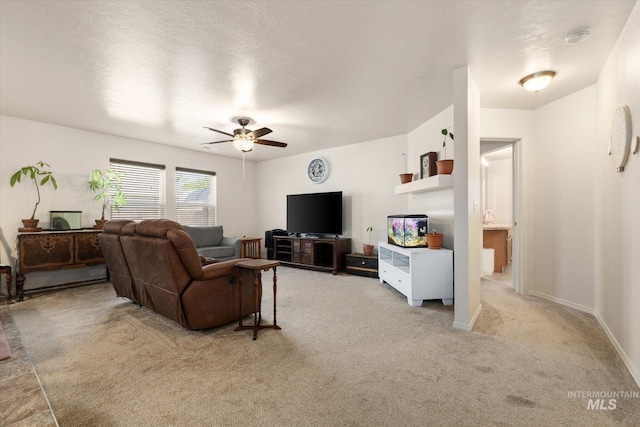 4590 E Stone Falls Dr, Nampa, ID 83686 - living area with light carpet, ceiling fan, and baseboards