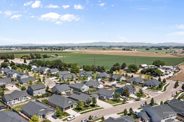 4590 E Stone Falls Dr, Nampa, ID 83686 - aerial view of property's location with a mountainous background and nearby suburban area