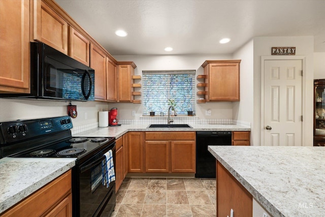 4590 E Stone Falls Dr, Nampa, ID 83686 - kitchen with black appliances, a sink, open shelves, light countertops, and brown cabinetry