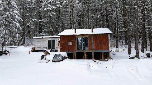 view of snow covered property