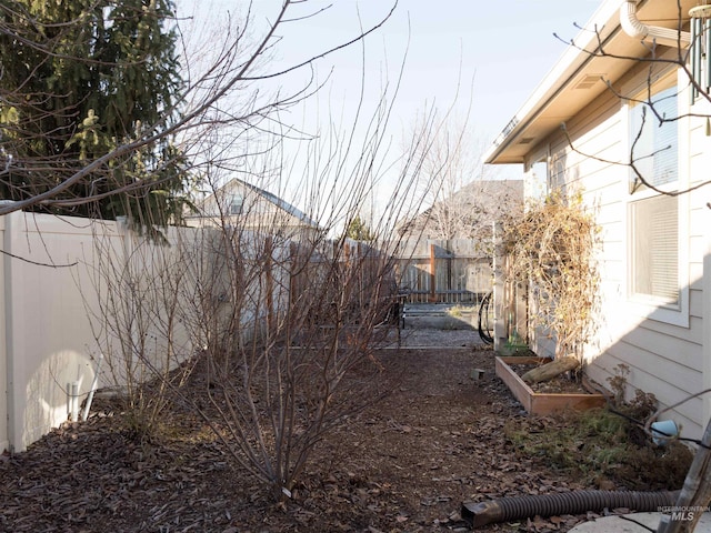 view of property exterior with a mountain view