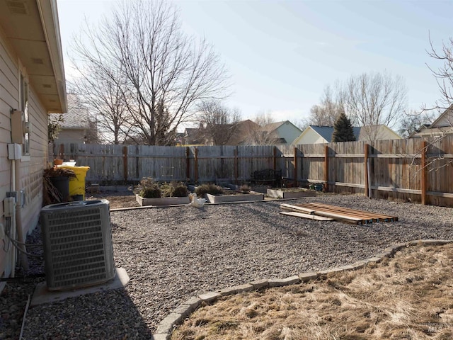 view of yard featuring central AC unit