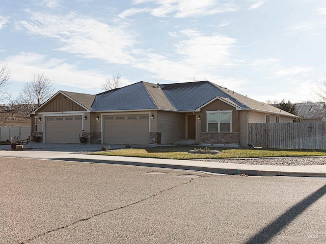 single story home with a garage